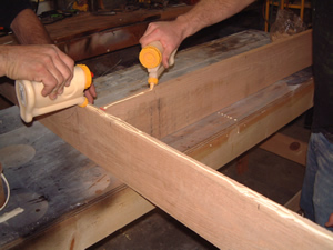 applying glue to edges of wood