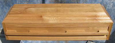 Premier Oak Casket with light stain.