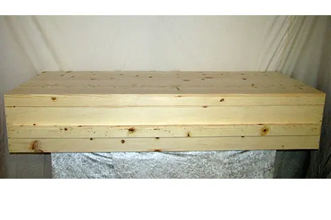 Simple Pine Casket - Our low cost simple pine caskets are very well suited for use in cremations, wakes, viewings and natural burials, as well as typical funerals.